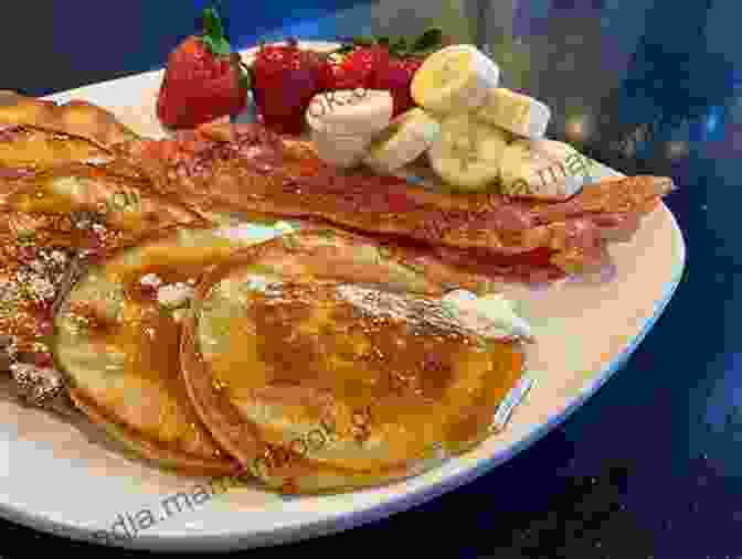 A Vibrant Breakfast Spread Featuring Fluffy Pancakes, Crispy Bacon, And Fresh Fruit Made From Scratch (Everyday Cookbook Collection)